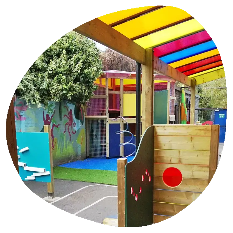 A play area with a colorful play structure.